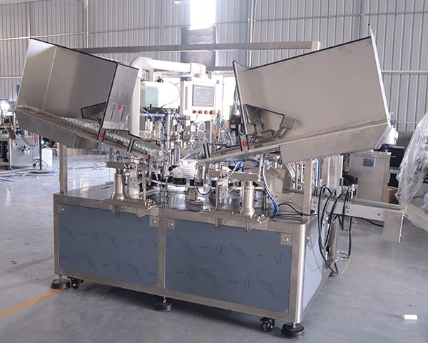 Fully automatic filling and sealing machine