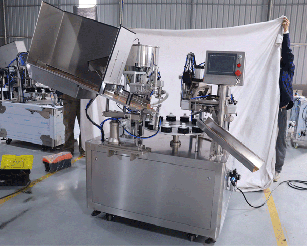 Single head fully automatic filling and sealing machine