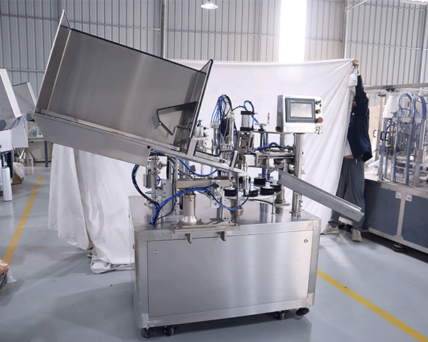 Single head fully automatic filling and sealing machine