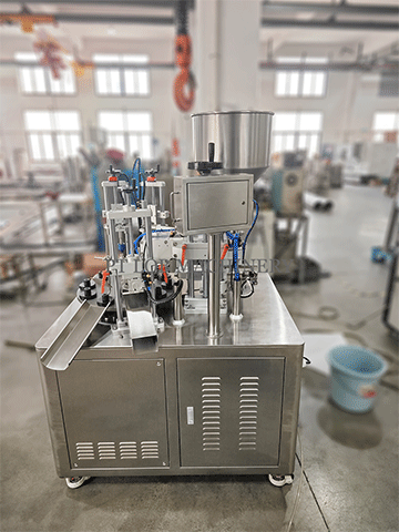 Ultrasonic filling and sealing machine